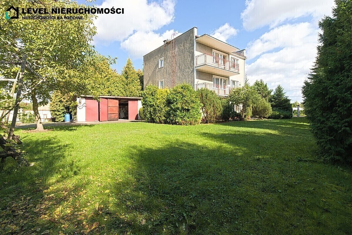 Elbląg LEVEL NIERUCHOMOŚCI Dom na dużej działce w Elbląguplus dwa garażeul. Freta NIERUCHOMOŚCI NA POZIOMIE