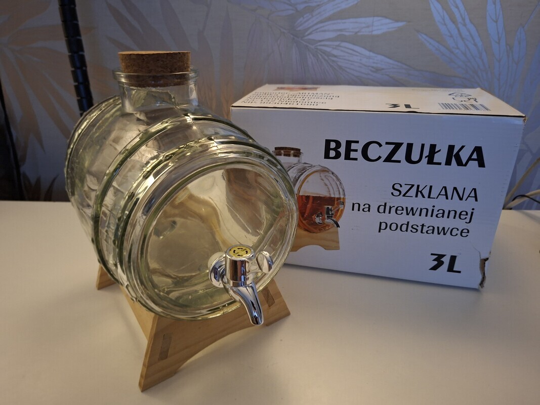 Elbląg Witam, sprzedam beczułkę szklaną z kranikiem o pojemności 3L na drewnianej podstawce wraz z oryginalnym