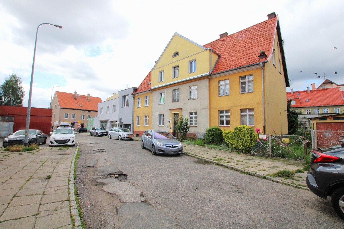 Elbląg NIERUCHOMOŚCI ANNA KRASZEWSKA  Poczuj niezwykły klimat przedwojennej kamienicy w sercu miasta!