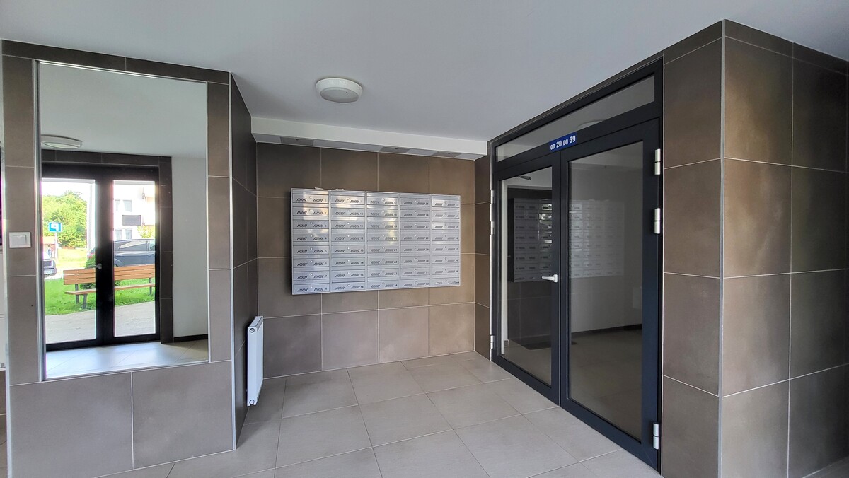 Elbląg KWADRAT NIERUCHOMOŚCI3 pokojebudynek z 2020 r. III piętro - windaduży balkonmedia z miastagaraż podziemny