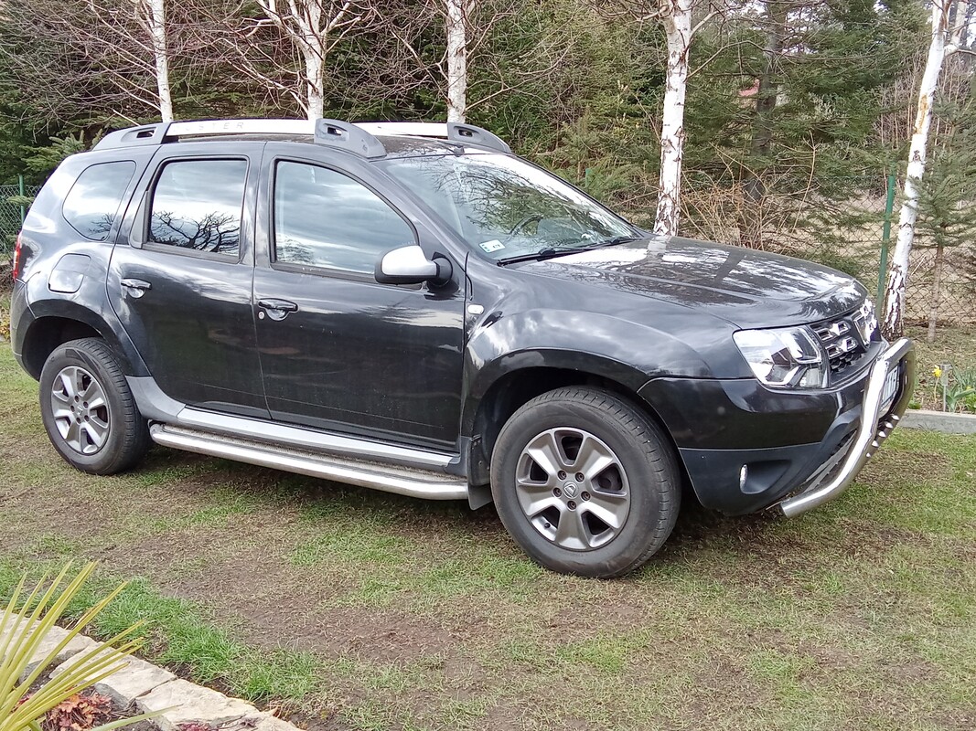 Elbląg Sprzedam: zadbana Dacia Duster SUV w kolorze czarnym, r. prod.2014,benzyna + LPG. Model Dacia Duster 13-Duster