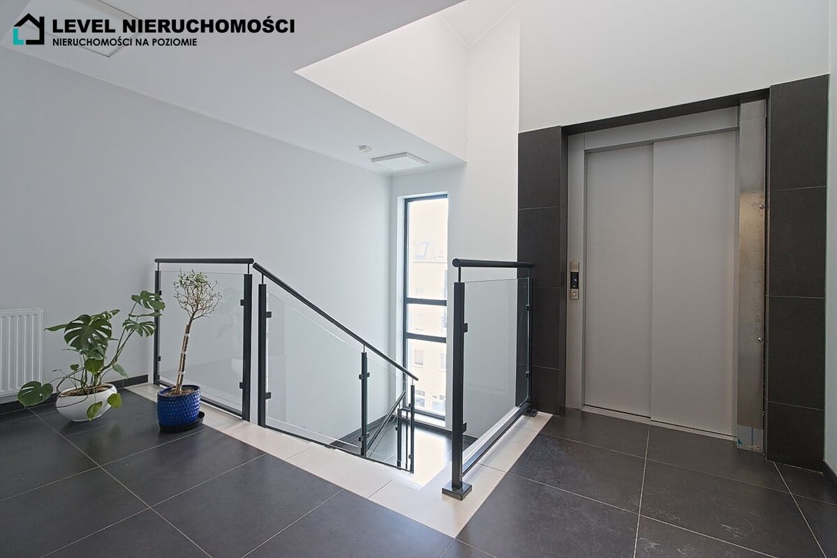 Elbląg LEVEL NIERUCHOMOŚCI Dwupoziomowy apartament z tarasemul. Stary Rynek NIERUCHOMOŚCI NA POZIOMIE