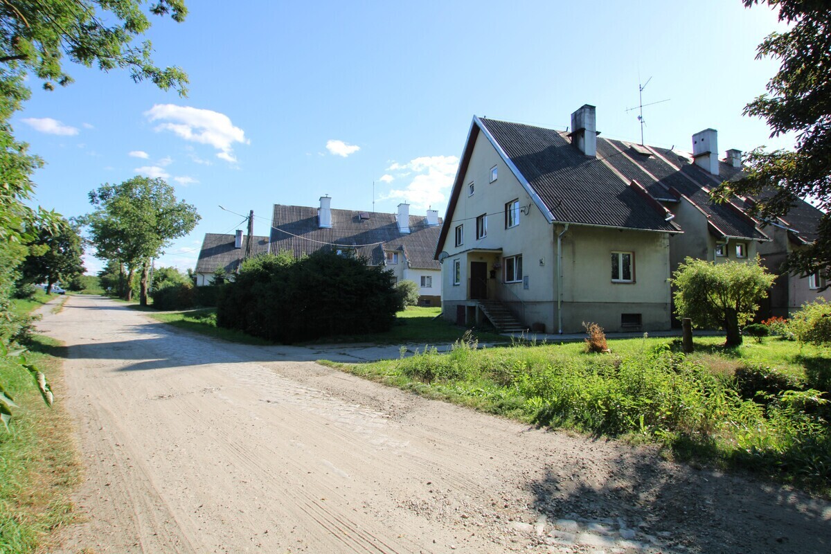Elbląg NIERUCHOMOŚCI ANNA KRASZEWSKA Bezczynszowe mieszkanie 1-pokojowe z garażem Mleczewo, gm.