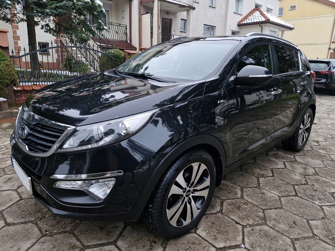 Elbląg Kia Sportage2.0 DieselKlimatronikAutomatyczna Skrzynia BiegówSkórzana tapicerkaNAPĘD 4 x 4Kamera CofaniaŚwiatła