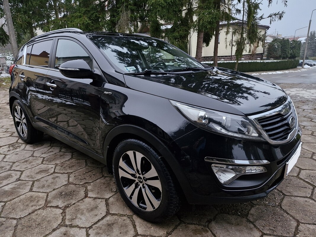 Elbląg Kia Sportage2.0 DieselKlimatronikAutomatyczna Skrzynia BiegówSkórzana tapicerkaNAPĘD 4 x 4Kamera CofaniaŚwiatła