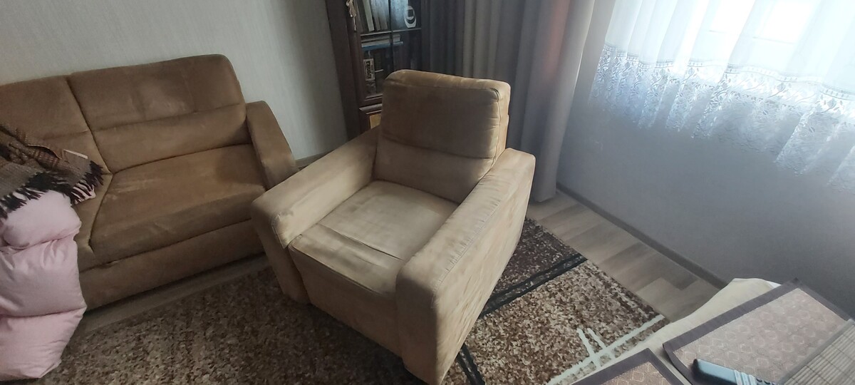 Elbląg Narożnik rozkładany z pojemnikiem na pościel plus fotel