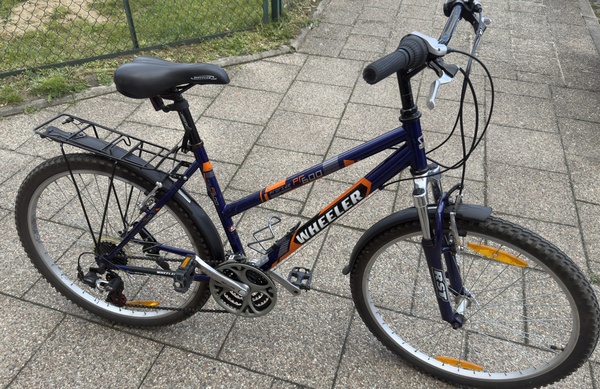 Elbląg Sprzedam damski rower firmy Wheeler WL600,kolor fioletowo - pomarańczowy.