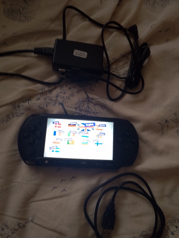 Elbląg Sprzedam zadbaną konsolę przenośną PSP E1004 street+ karta pamięci 4 GB+ gra little big planet platformowka.