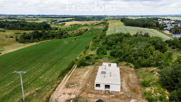 Elbląg FREEDOM NIERUCHOMOŚCISprzedam dom - Dzierzgoń, Słoneczna. Sprzedam działkę 0,1049 ha z rozpoczętą budową w