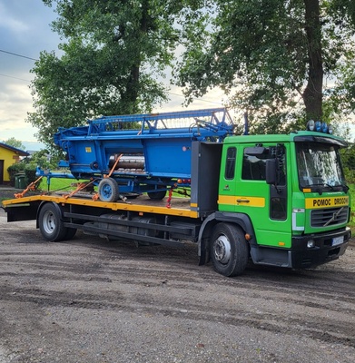 Elbląg Oferuję Usługi Transportowe Auto Lawetą. Usługa obejmuje przewóz: - Maszyn budowlanych - Maszyn rolniczych -