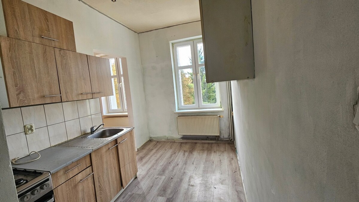 Elbląg BIURO NIERUCHOMOŚCISZULC& SZULCNA SPRZEDAŻMieszkanie - Elbląg ul. ŻeromskiegoPowierzchnia: 40 m2Mieszkanie