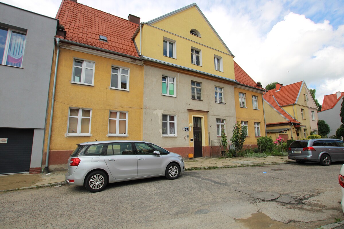 Elbląg NIERUCHOMOŚCI ANNA KRASZEWSKA  Poczuj niezwykły klimat przedwojennej kamienicy w sercu miasta!