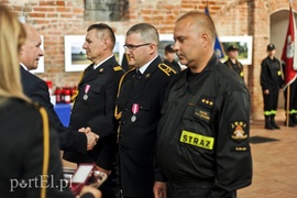 Święty Florian przyniósł strażakom awanse i odznaczenia